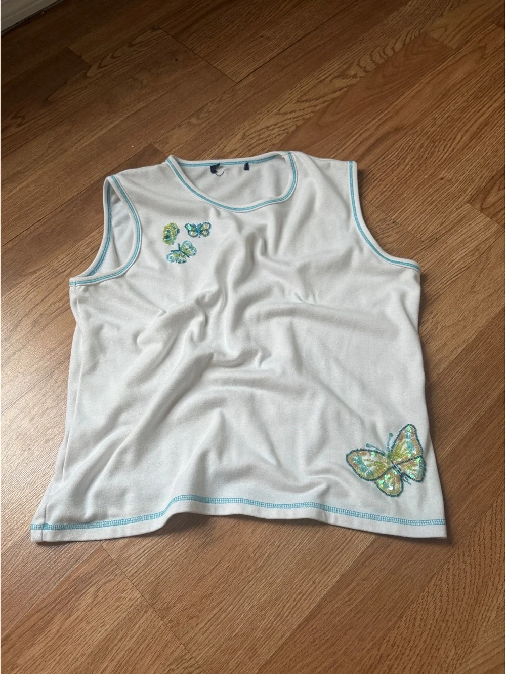White Sleeveless Top with Beaded Butterfly Embellishments